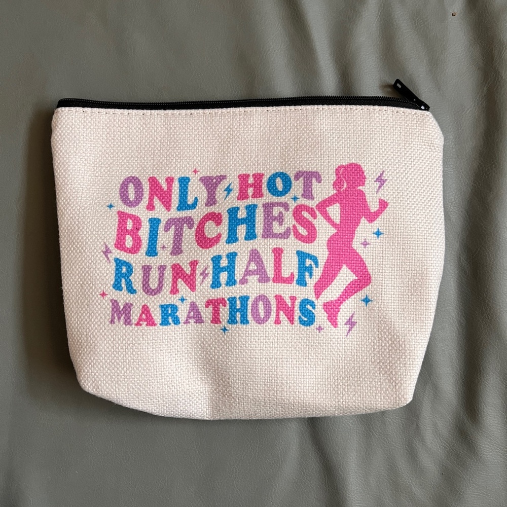 Stylish Cream Pouch with Bold Print